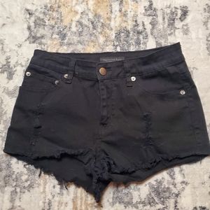 American Bazi Women's Black Distressed shorts with stretch. Size Medium.